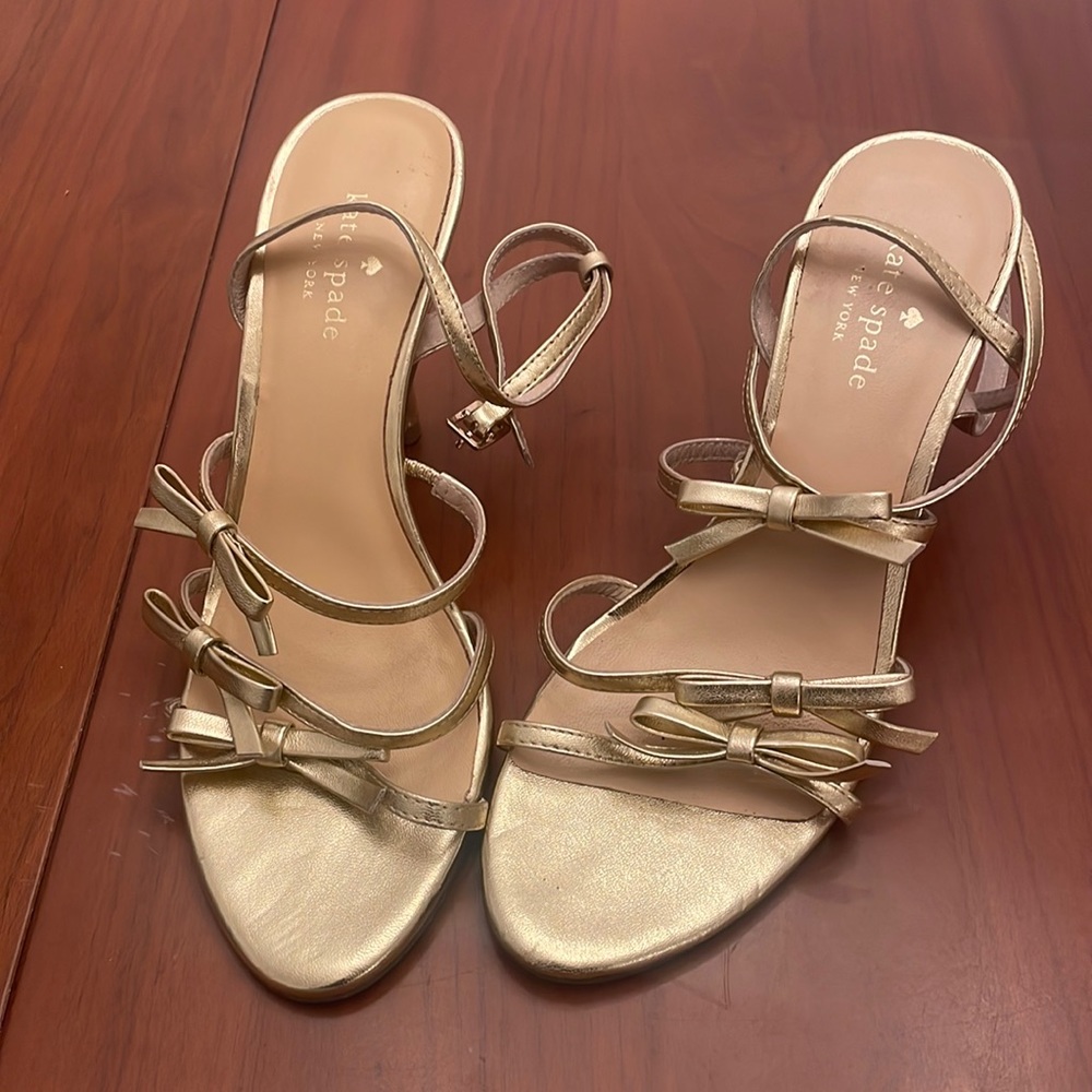Gold Kate Spade strappy high heeled sandal, size 8. Great condition.